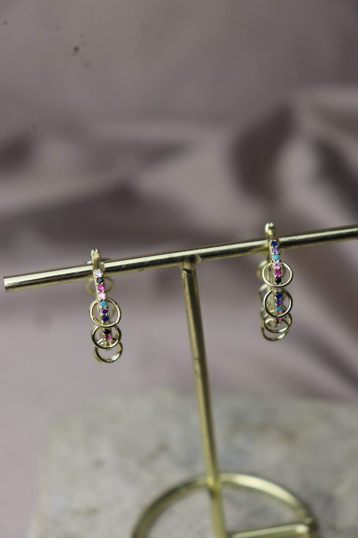 Argollas diferentes con circones de colores #139