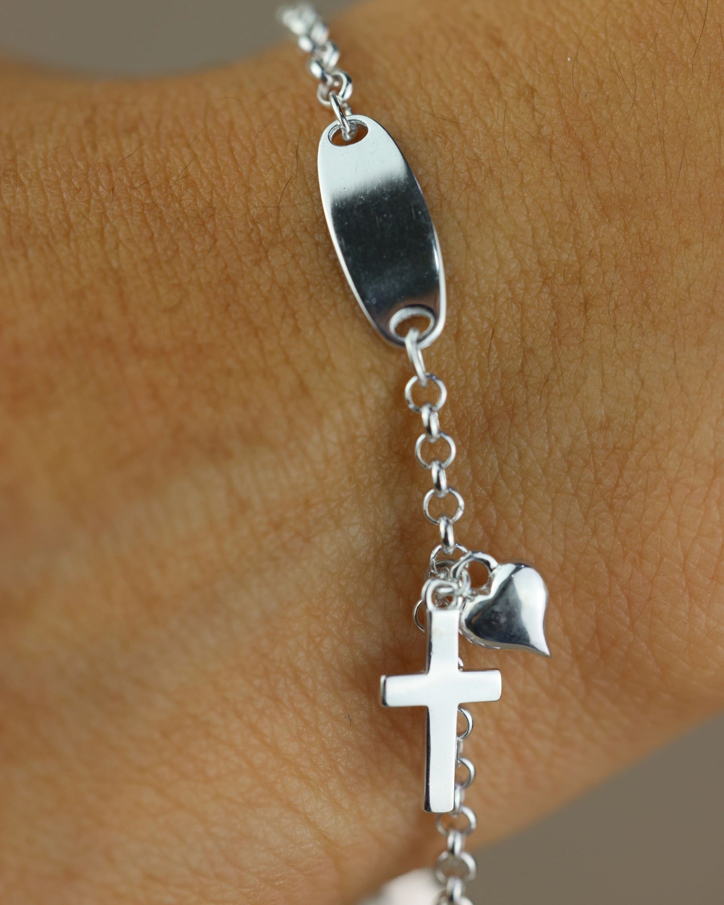Pulsera con dijes de corazón y cruz #154