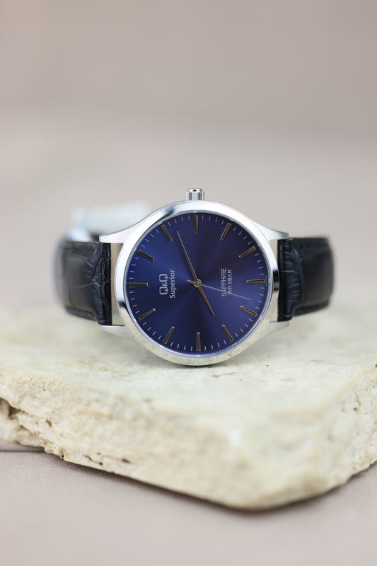 Reloj fondo azul Q&Q #295