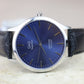 Reloj fondo azul Q&Q #295