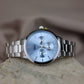 reloj Q&Q fondo celeste #327