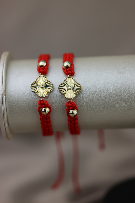 Pulsera tejida con dije de flor #505