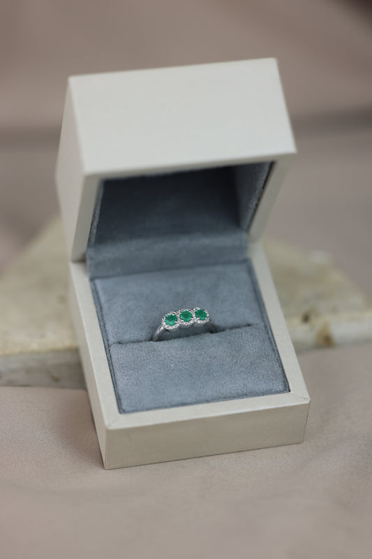 Round-cut emerald ring