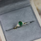 Oval-cut emerald ring