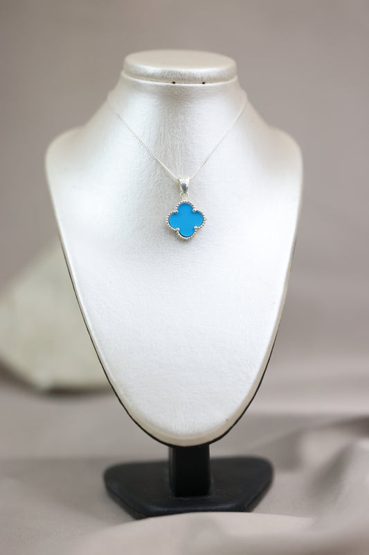 Collar con dije de flor celeste #574