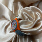 Reloj gris con detalles anaranjados #A63