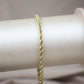 Pulsera tejido cordón 10k #32