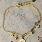 Pulsera con tejido paper clic con dije de carita #131