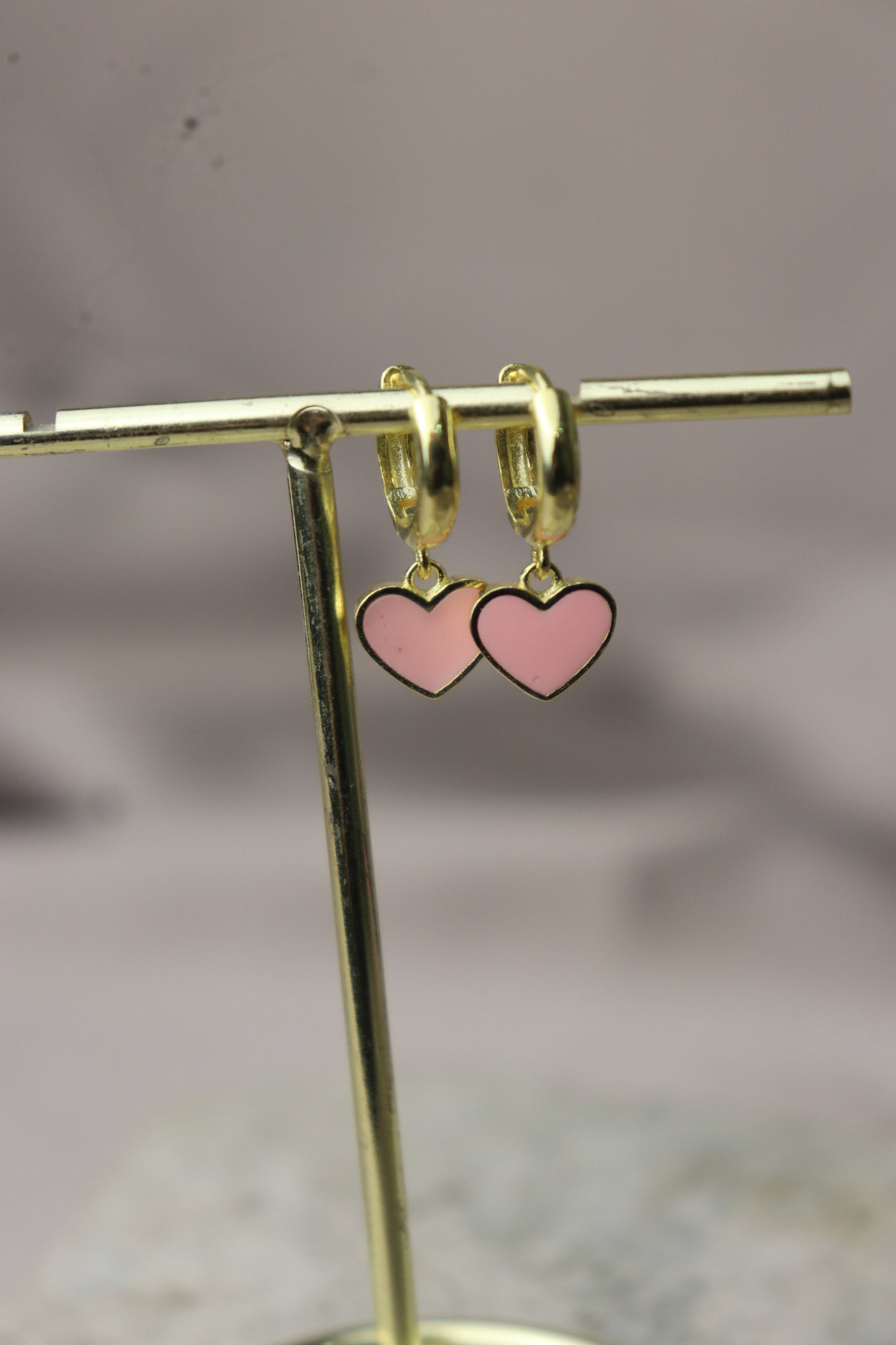 Argollitas con dije de corazoncitos