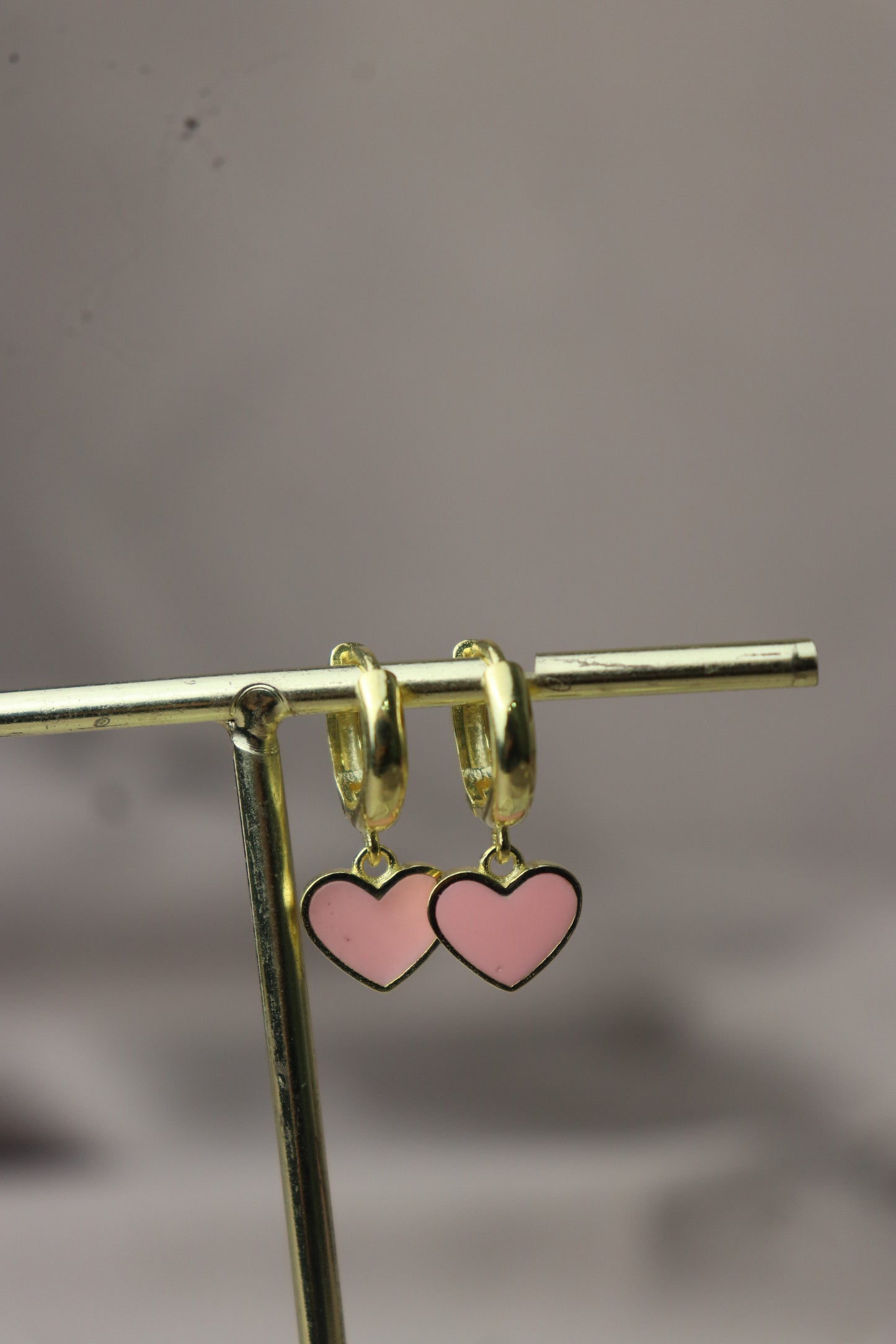 Argollitas con dije de corazoncitos