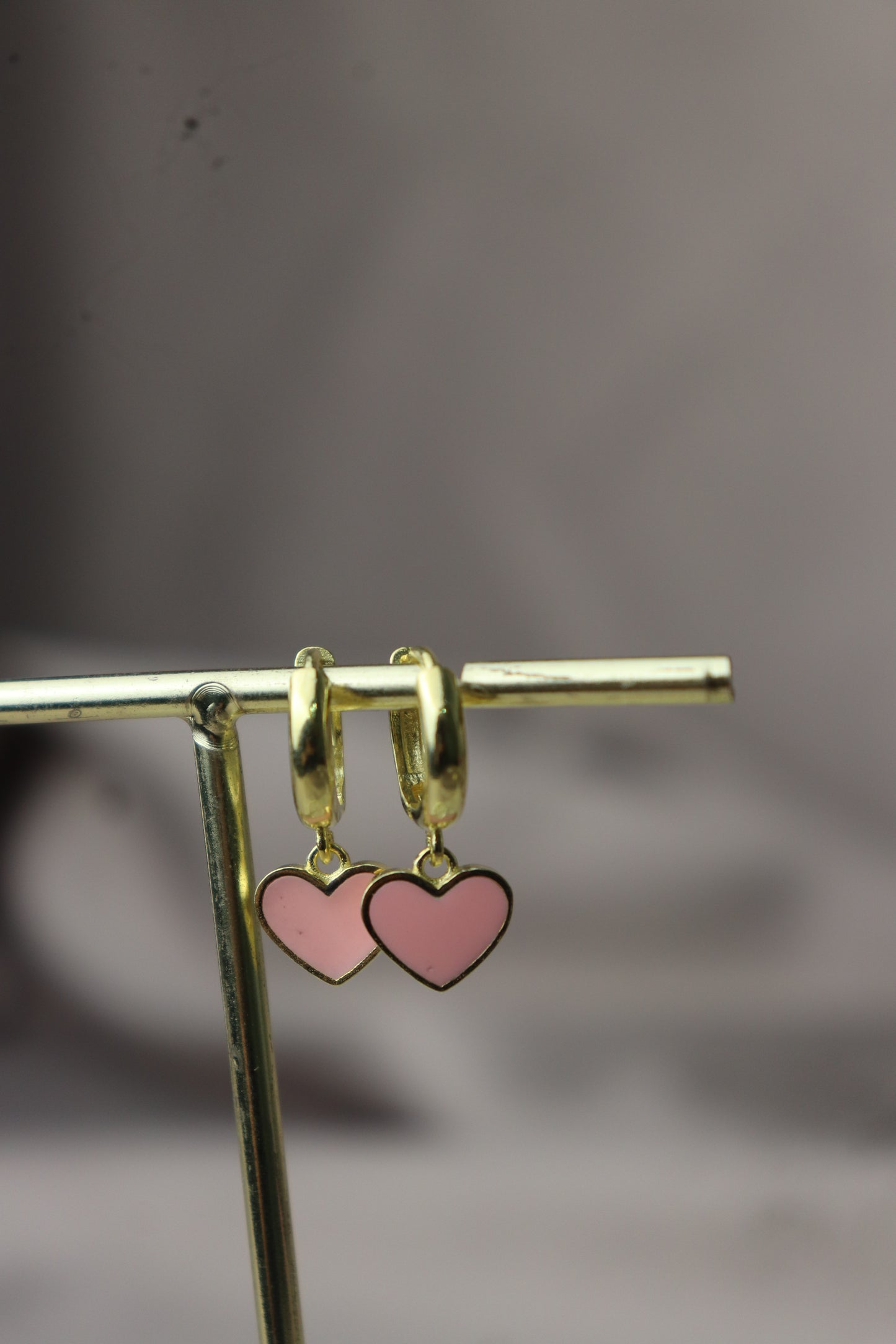 Argollitas con dije de corazoncitos