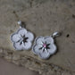 Dije en forma de flor con estrella en el centro #142